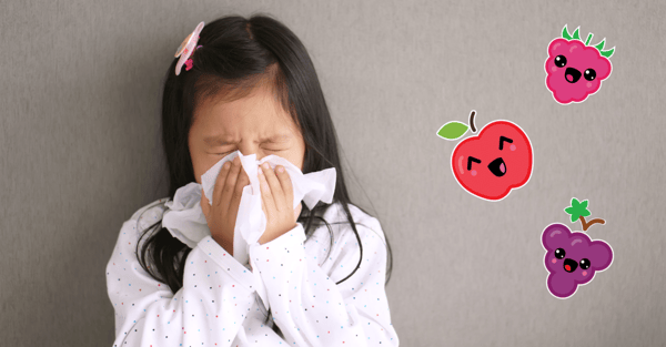 Girl with seasonal allergies sneezing